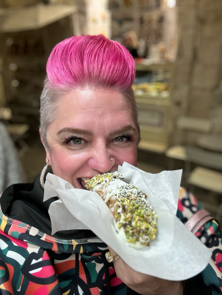 Jenna enjoying cannoli in Sicily