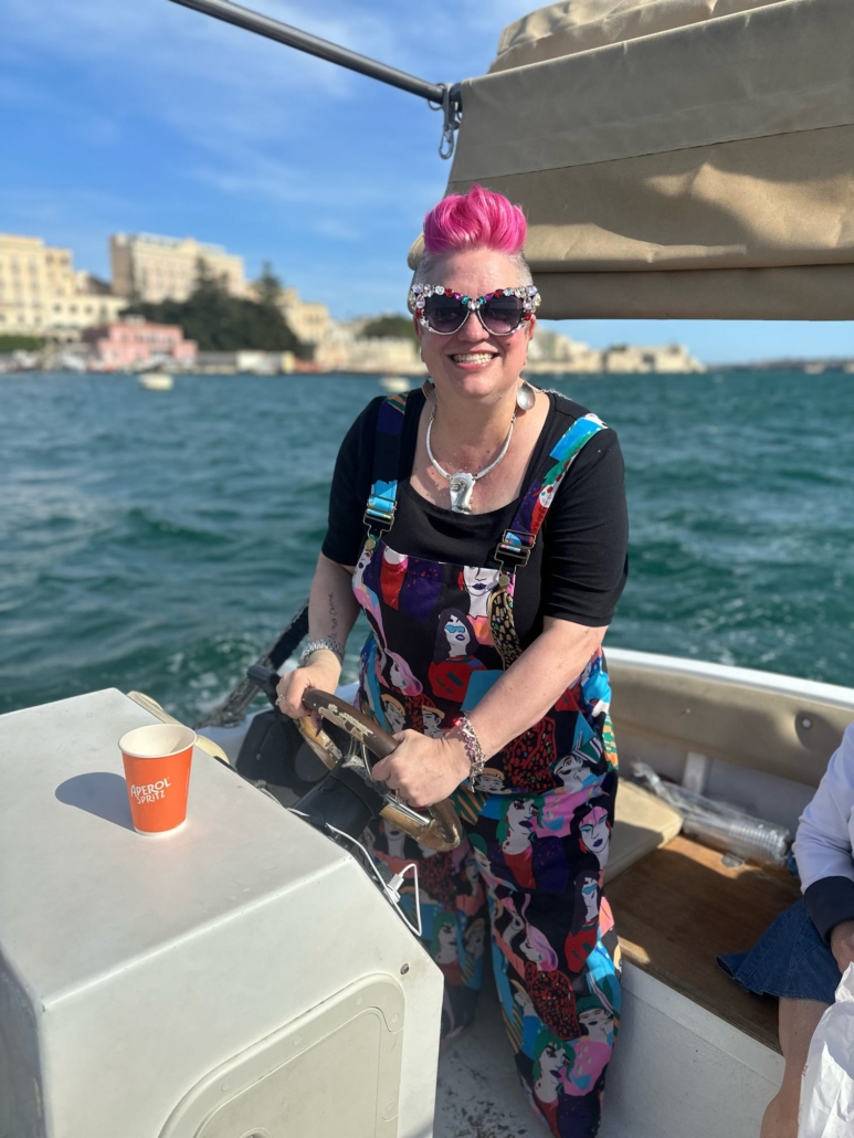 Jenna on a boat in Sicily